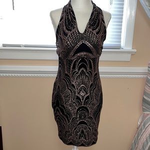 Mini black dress with rose gold glitter